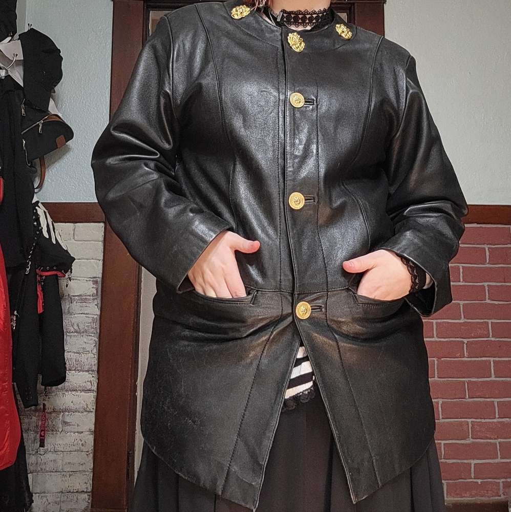 Vintage Black Leather Jacket with Gold Lion Accents